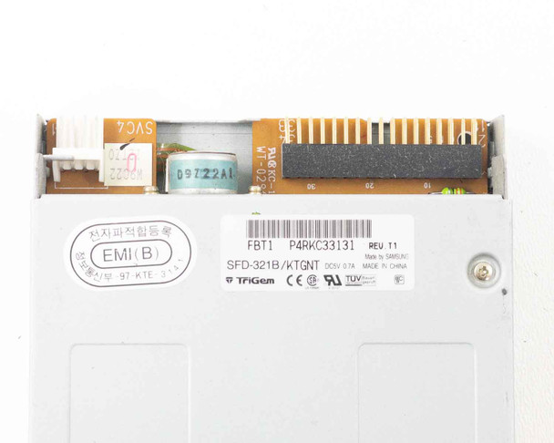 Floppy drive rear connector view showing 34-pin IDC interface and Berg power connector