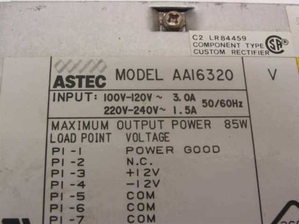 Astec AA16320 label closeup showing model number, input voltage 100-120V 3.0A / 220-240V 1.5A 50/60Hz, 85W max output, and CSA certification