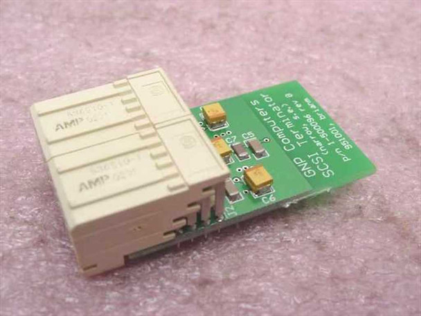 GNP Computers 1-500096 Rev B SCSI Terminator rear view showing AMP connector block and green PCB
