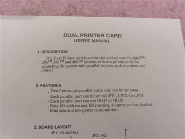 Magitronic A-B109 Dual Printer Card user's manual open to description and features page showing Centronics port and LPT/IRQ details