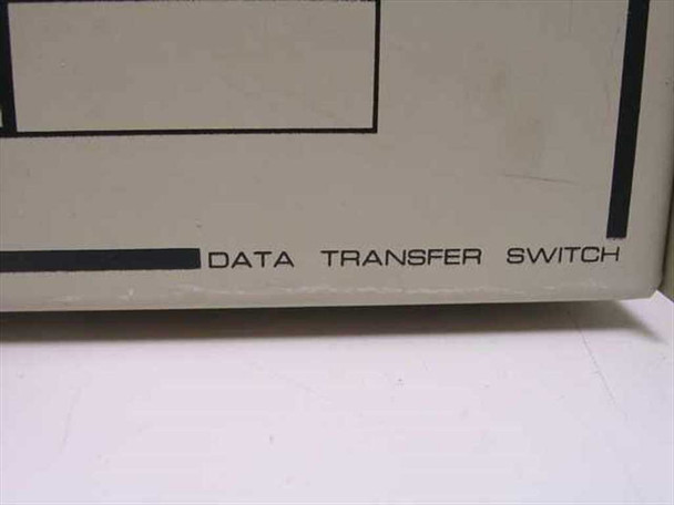 Close-up of data transfer switch front panel lower-right corner showing DATA TRANSFER SWITCH label
