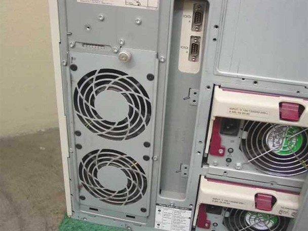 Compaq ProLiant 6000 rear side panel view showing large chassis cooling fans and power supply units
