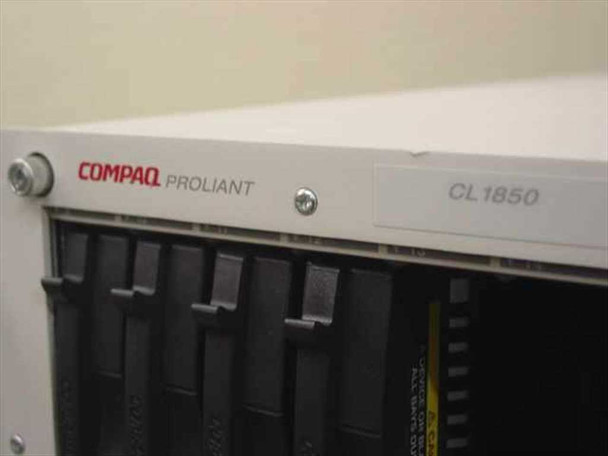 Compaq ProLiant CL1850 front panel close-up showing Compaq ProLiant branding and CL1850 model designation with drive bay slots