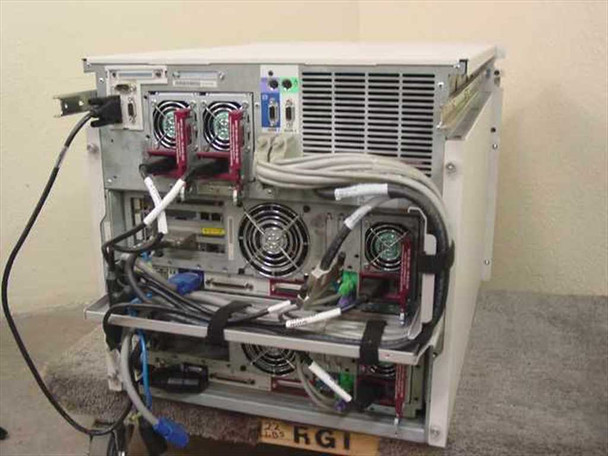Compaq ProLiant CL1850 rear view showing full backplane with multiple cooling fans, expansion cards, and cable routing across both nodes