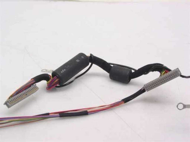 Toshiba Satellite P-100 cable assembly – angled view showing both ends: multi-pin flat connector on left, inline connector block in center, and ground lug on right