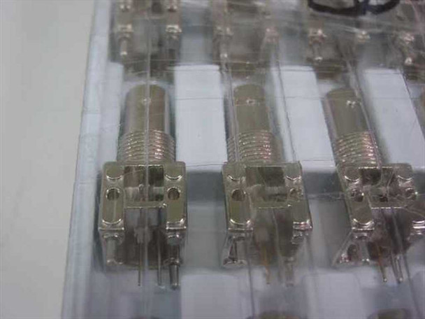 Sony 1-561-072-00 BNC plug housing connectors — angled close-up showing nickel-plated body and mounting tabs
