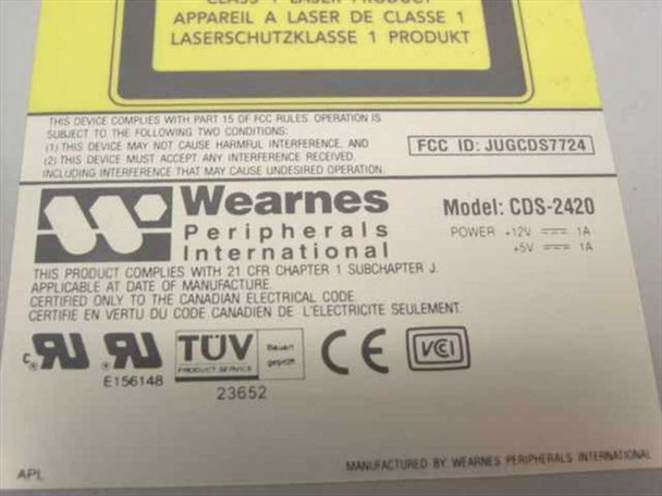 Wearnes Peripherals CDS-2420 rating label showing model number, FCC ID JUGCDS7724, power requirements +12V/+5V 1A each, UL, TÜV, CE certifications