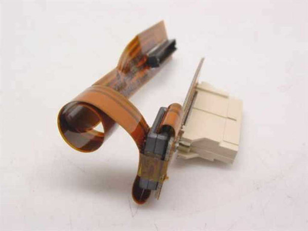Apple 821-0056-A PowerBook 520C video harness adapter — angled view showing curled flex ribbon and connector end detail