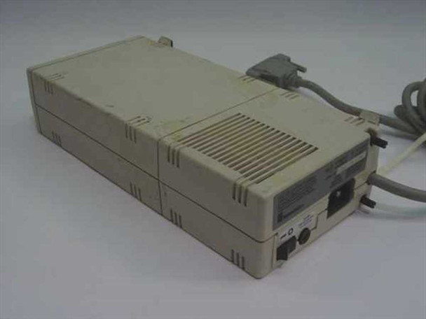Mountain 01-30523-01 External Tape Drive – rear left view showing ventilation grille, power inlet, power switch, and DB9 connector with cable