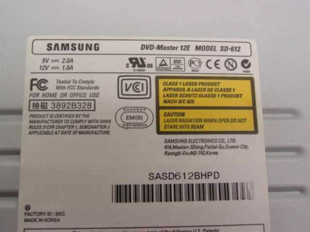Samsung SD-612 DVD-Master 12E top label close-up showing model name, 5V 2.0A 12V 1.5A power specs, FCC and CE markings, Made in Korea, serial SASD612BHPD