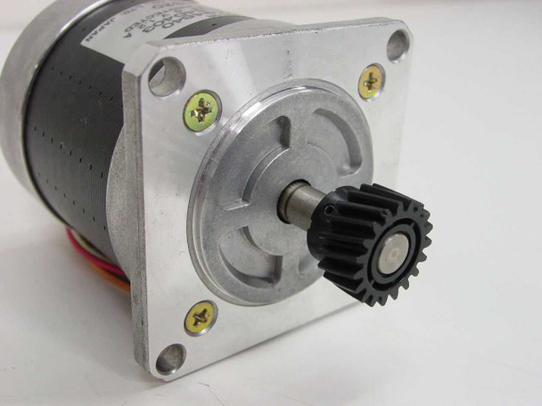 Shinano Kenshi 127K94840 stepper motor flange-end view showing gear, shaft, and four mounting holes