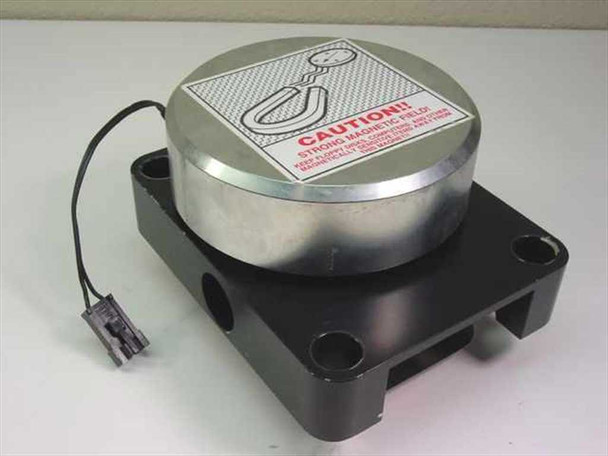 Ultratech Stepper electro magnet assembly – top view showing CAUTION strong magnetic field warning label on aluminum housing