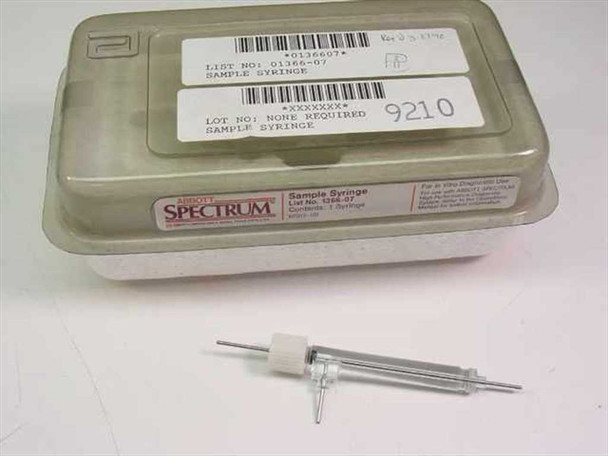 Abbott Spectrum 1366-07 Sample Syringe shown beside sealed clamshell packaging with barcode label — front view