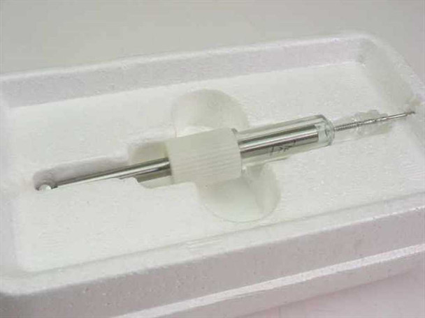 Abbott Spectrum 1366-08 ISE Reagent Syringe resting in foam-lined inner tray of storage case