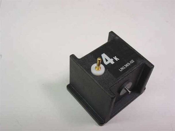 Abbott 1365-02 K+ Potassium Electrode module close-up — front face showing gold contact pin, white insulator, and '4K / LN1365-02' markings on black housing