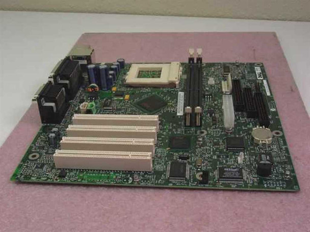 Dell 15JDG PGA370 Motherboard – three-quarter view showing CPU socket area, PCI slots, chipset IC, DIMM slots, and coin-cell battery