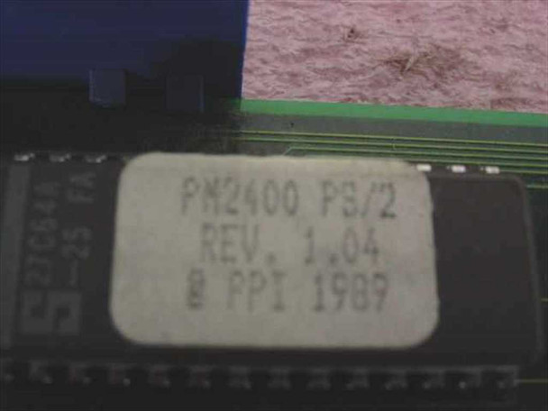 Close-up of PM2400 PS/2 label showing model number, Rev 1.04, and copyright PPI 1989