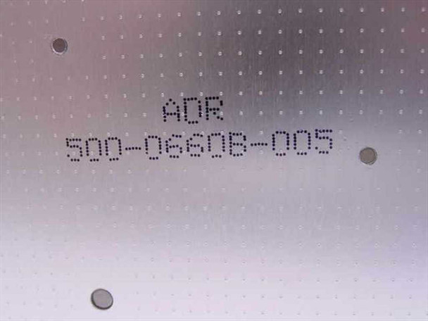 Close-up of OnStream ADR cartridge metal plate label clearly showing part number 500-0660B-005
