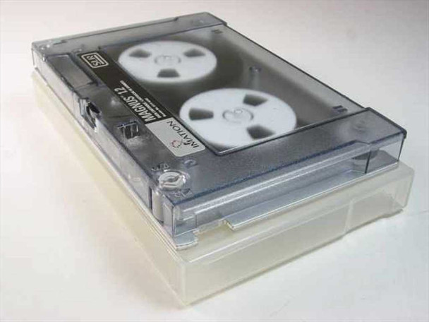 Imation Magnus 1.2 SLR data cartridge tape in clear plastic storage case, angled top view showing tape reels through transparent shell