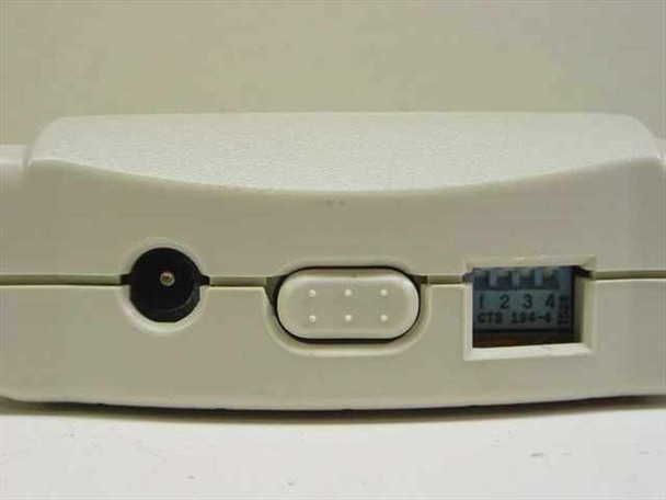 Linksys PASB421 — bottom edge showing DC power jack, cable port, and 4-position DIP switch