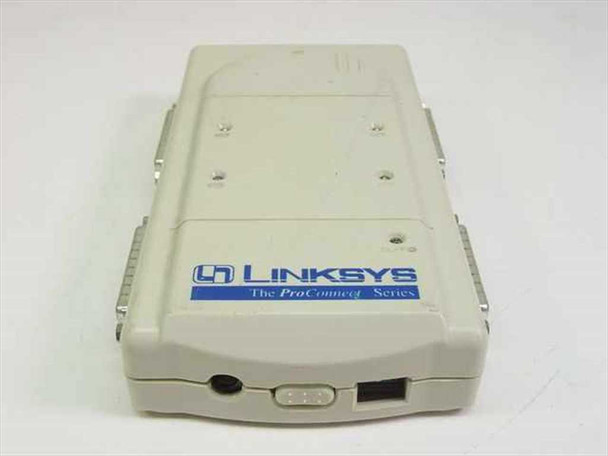 Linksys PASB421 ProConnect Series Compact Auto Switch — top/front view showing Linksys logo and DC power jack