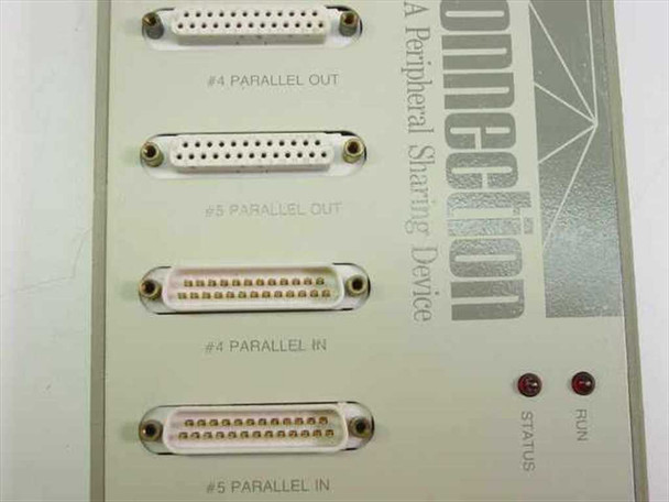 LC-01 Logical Connection close-up of parallel port connectors labeled Parallel Out 4 and 5 and Parallel In 4 and 5 with Status and Run indicator LEDs