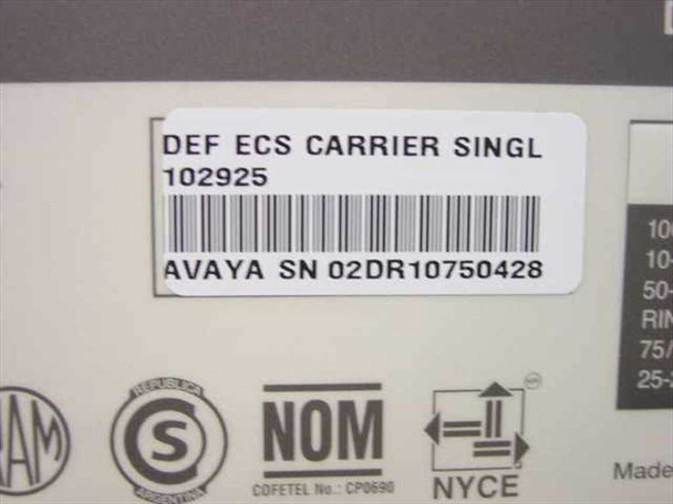 Avaya 102925 label closeup – DEF ECS CARRIER SINGL part number label with barcode and Avaya serial number