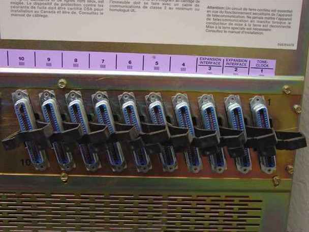 Avaya Definity rear cabinet — Row A connector panel showing slots 1-10 with 50-pin telco (Champ) connectors and Expansion Interface / Tone Clock labels