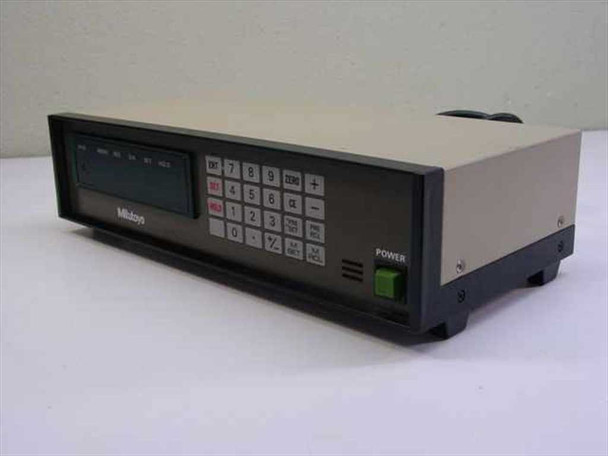 Mitutoyo GMR-2705 digital indicator readout — front-left three-quarter view showing LCD display, numeric keypad, and green power button