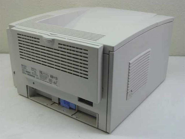 HP LaserJet 2100xi laser printer rear view showing ventilation grilles and dual blue port interface connectors
