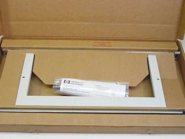 HP J1469A E60 Rack Mount Kit in original cardboard box with bezel panel and HP hardware bag visible
