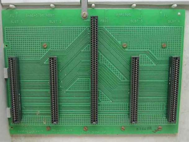Avaya Partner II 103F PBX backplane close-up showing 140045790 ASSY board with 4 module slots labeled Slot 1 through Slot 4