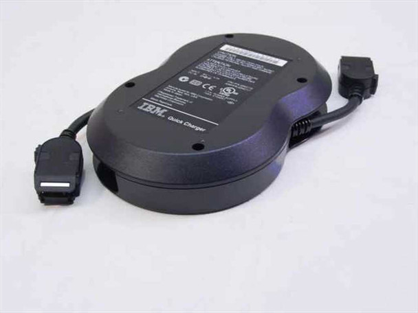 IBM 02K6719 ThinkPad Quick Battery Charger – reverse angled view showing IBM Quick Charger branding and cable routing