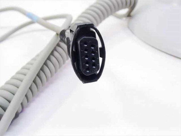 Close-up of Metrologic MS9520 Voyager PowerLink connector end showing 9-pin multi-interface plug