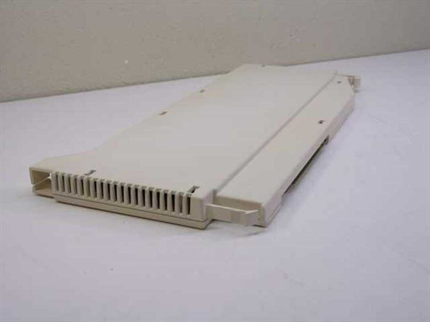 Avaya 408 GS/LS-MLX Merlin PBX module — angled top view showing beige plastic housing and ventilation slots