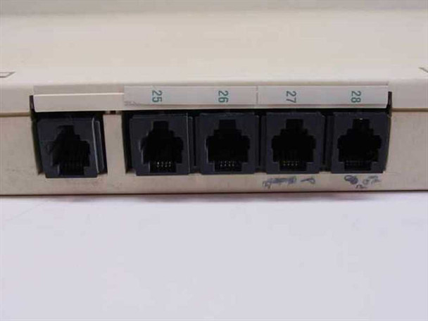 Avaya 400 GS/LS/TTR module — port end showing four modular RJ-style jacks numbered 25 through 28