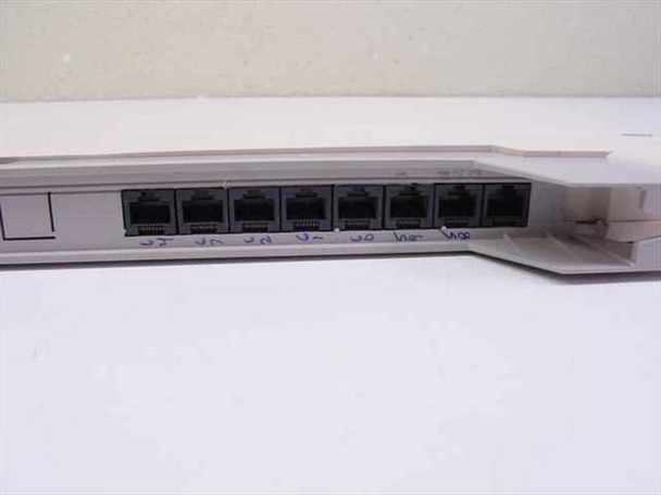 Avaya Merlin 008 MLX Module 617C21 — port end showing 8 RJ-45 MLX ports with handwritten port labels