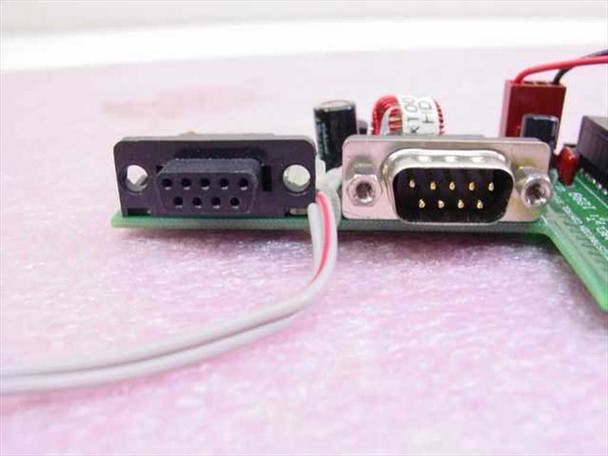 Registration Control Systems CBM adapter — close-up of DB9 female and DB9 male serial connectors showing 9-pin serial interface ports