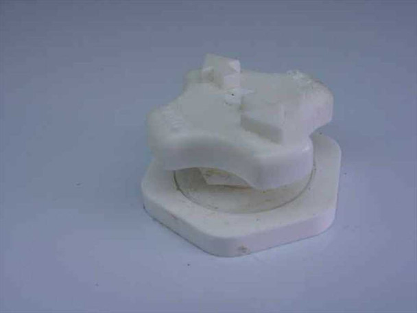 White plastic cam lock or elbow fitting component — quarter-turn style, clean room compatible
