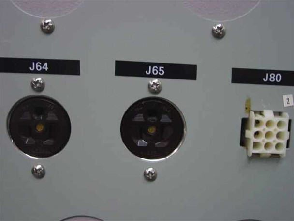 Close-up of output connectors J64 and J65 twist-lock receptacles and J80 multi-pin connector on power conditioner enclosure panel