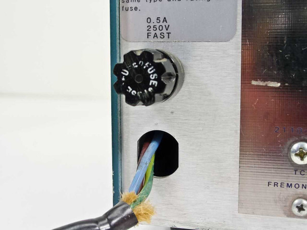 TCL 2110 rear panel fuse holder close-up showing 0.5A 250V Fast fuse rating label and fuse cap with power cord entry
