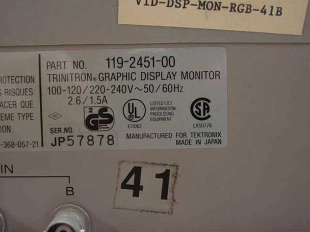 Tektronix 119-2451-00 rating label showing Trinitron Graphic Display Monitor, 100-240V 50/60Hz, serial number JP57878, Made in Japan
