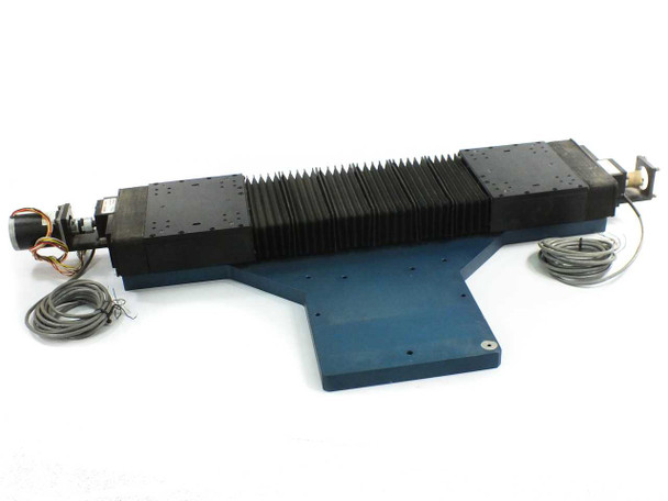 Lintech 47411 dual precision linear stage full assembly view from above at angle, showing dual bellows covers and servo motor with pigtail cables