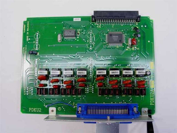 Toshiba PDKU2 8-line digital station card – top view of green PCB showing card label, connector, and eight line interface components
