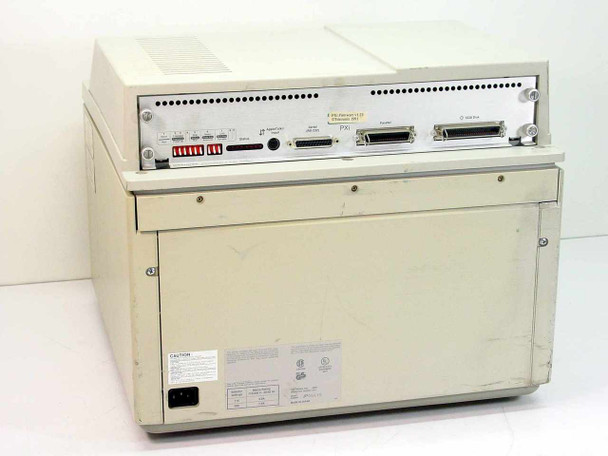 Tektronix 4694PXi Phaser II rear view showing I/O panel, DIP switches, AppleTalk connector area, AC power inlet, and rating label