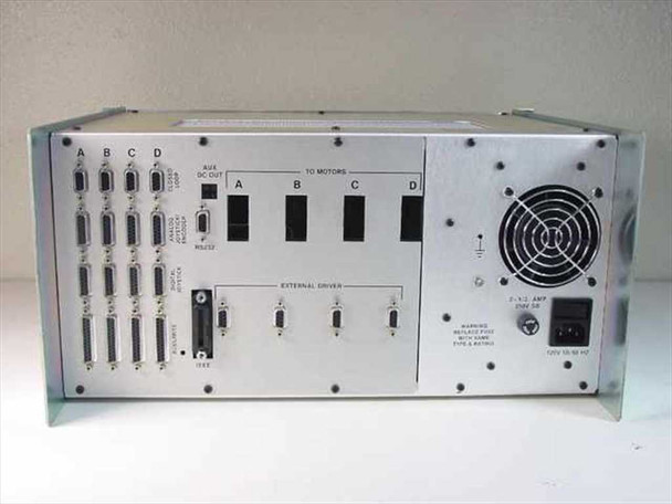 Jomar Precision Systems 010-2734-001 — rear panel view showing closed-loop, analog joystick/encoder, digital joystick, IEEE, RS-232, motor outputs, external driver ports, AC inlet, and cooling fan