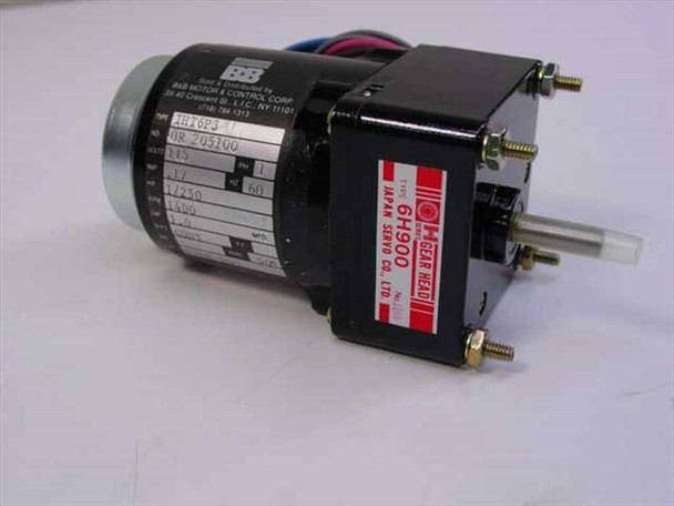 Japan Servo IHT6P3 6H900 gear head motor, three-quarter front view showing motor body and gear head with red Japan Servo Co. label
