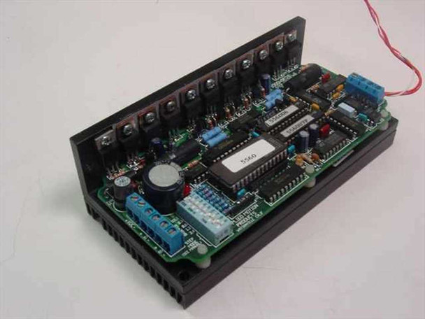 Applied Motion Products 1000-062B Step Motor Driver – angled top view showing exposed PCB, power transistors, DIP ICs, and terminal blocks with red wire leads