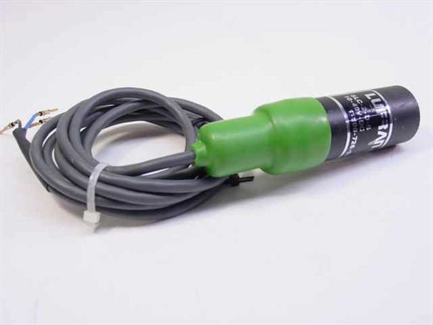 LUFRAD SLC-2-D-S proximity switch full view showing cylindrical black body with green connector collar and attached grey pigtail cable with bare wire leads