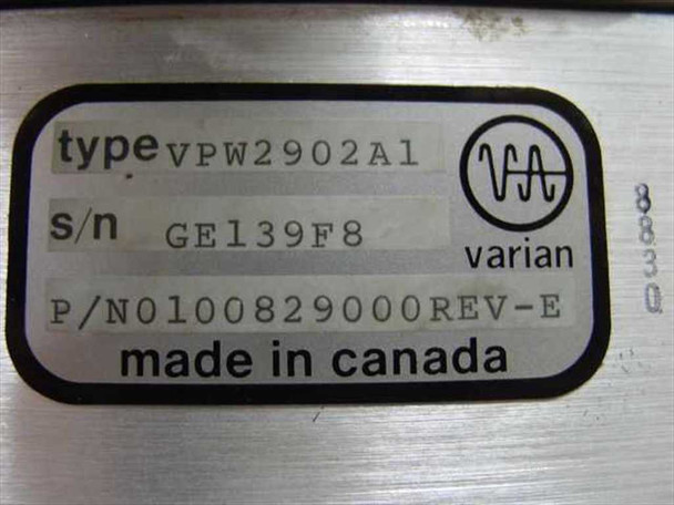 Close-up data label on Varian TWTA RF assembly reading Type VPW2902A1, S/N GE139F8, P/N 0100829000 REV-E, Made in Canada